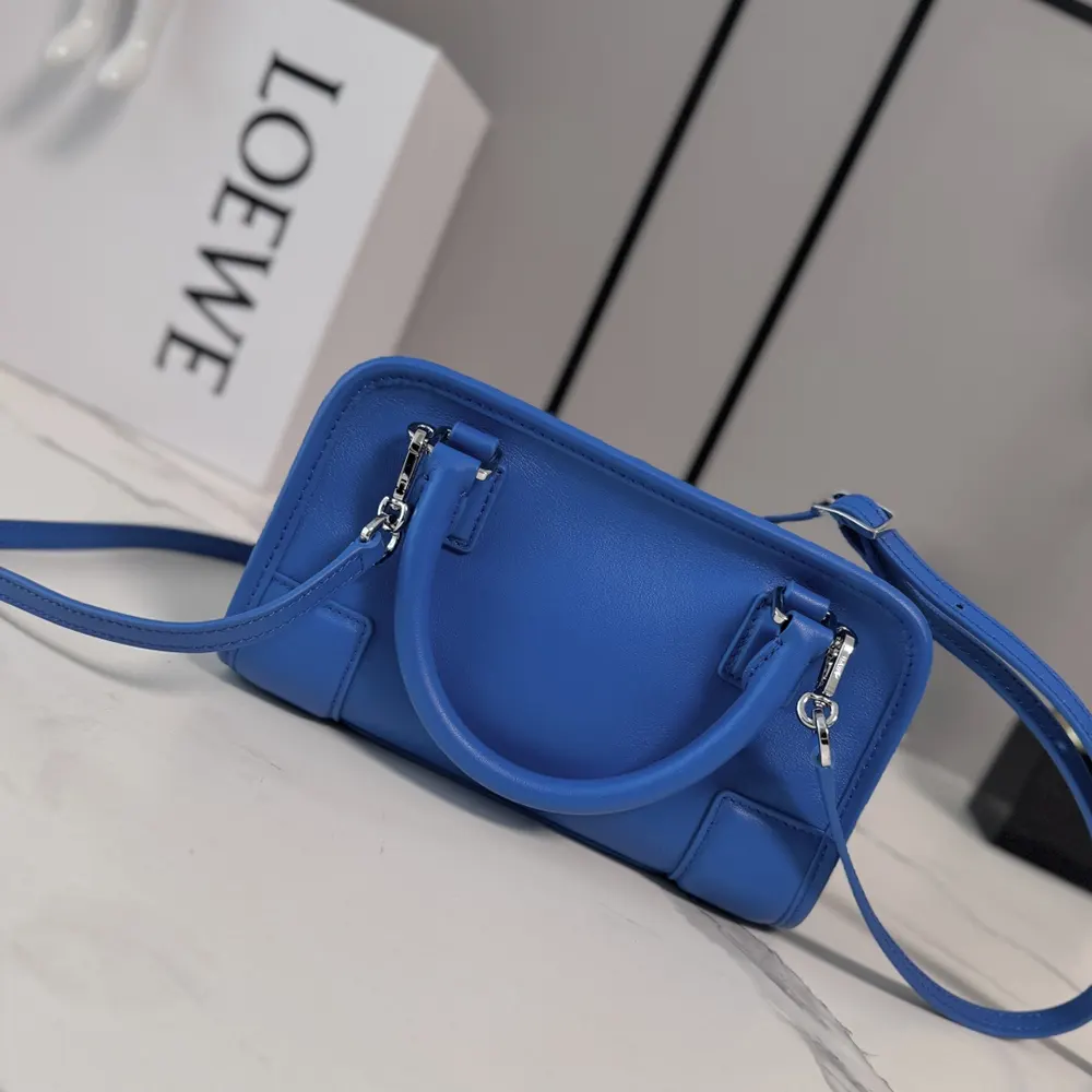 Side angle showing silver-tone hardware on Loewe Mini Amazona 180 Bag