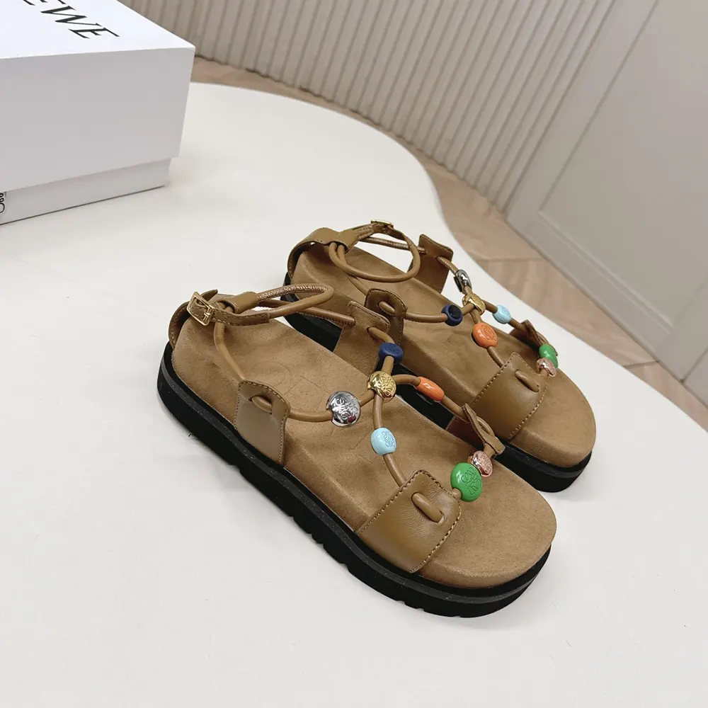 Overhead shot displaying soft nappa lambskin on Loewe Women Pebble Beads Fussbett Sandal