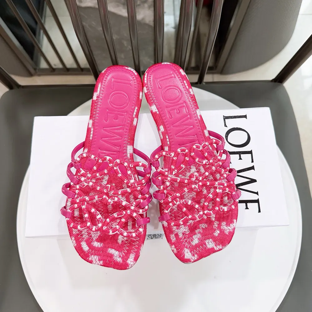Close-up of embroidered anagram detail on Loewe Women Petal Anagram Slide
