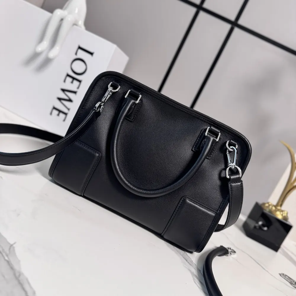 Side angle showing silhouette and shoulder strap of Loewe Women Small Amazona 180 Bag