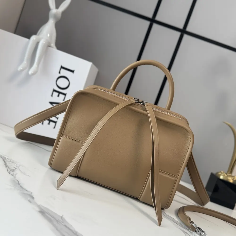 Close-up of Loewe logo embossed hardware on Amazona 180 bag