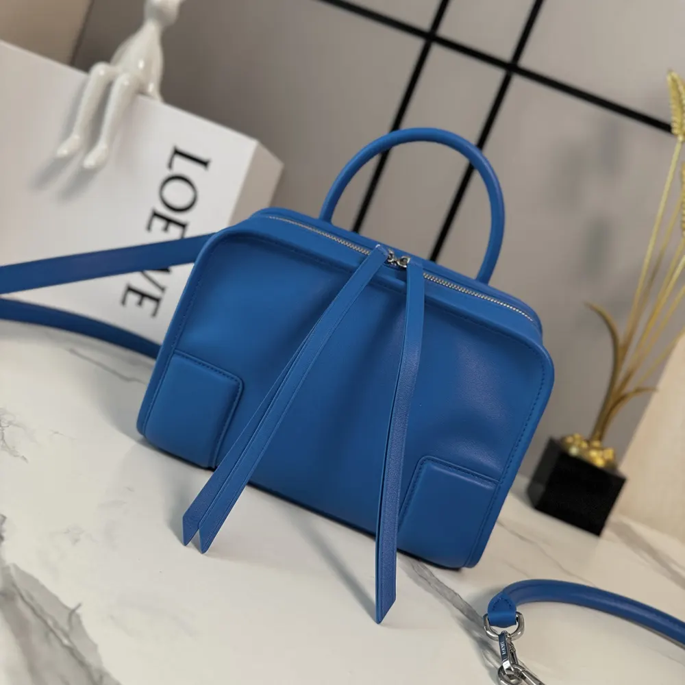Close-up of silver Loewe logo hardware on Small Amazona 180 Bag