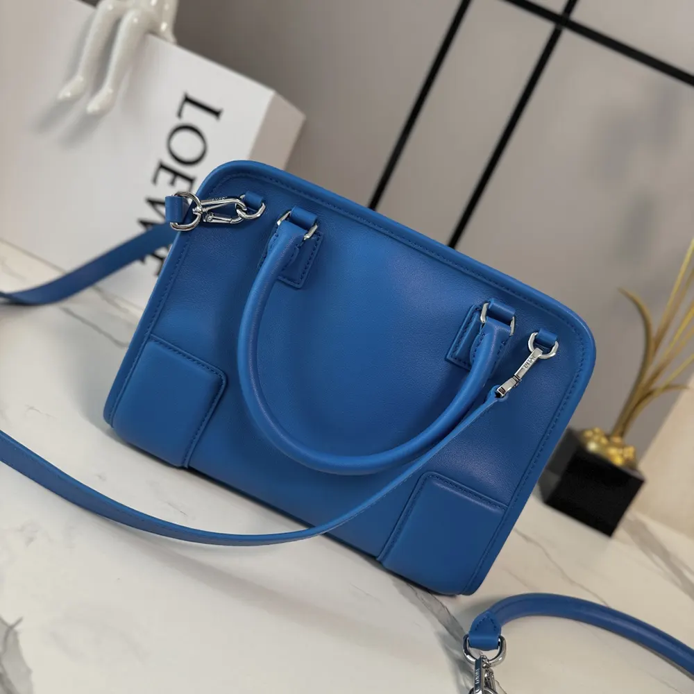 Side angle showing zipper closure on Loewe Small Amazona 180 Bag