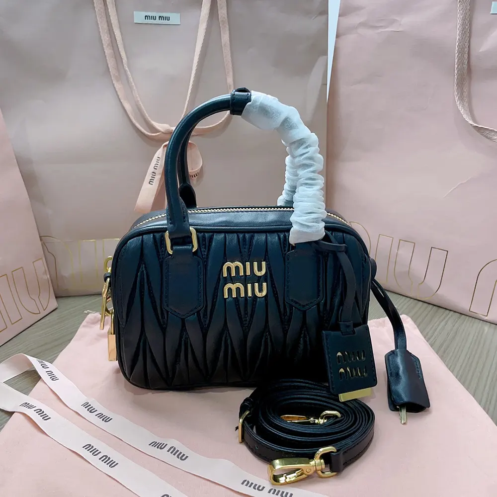 Close-up of matelassé quilting on Miu Miu Women Arcadie Bag in black
