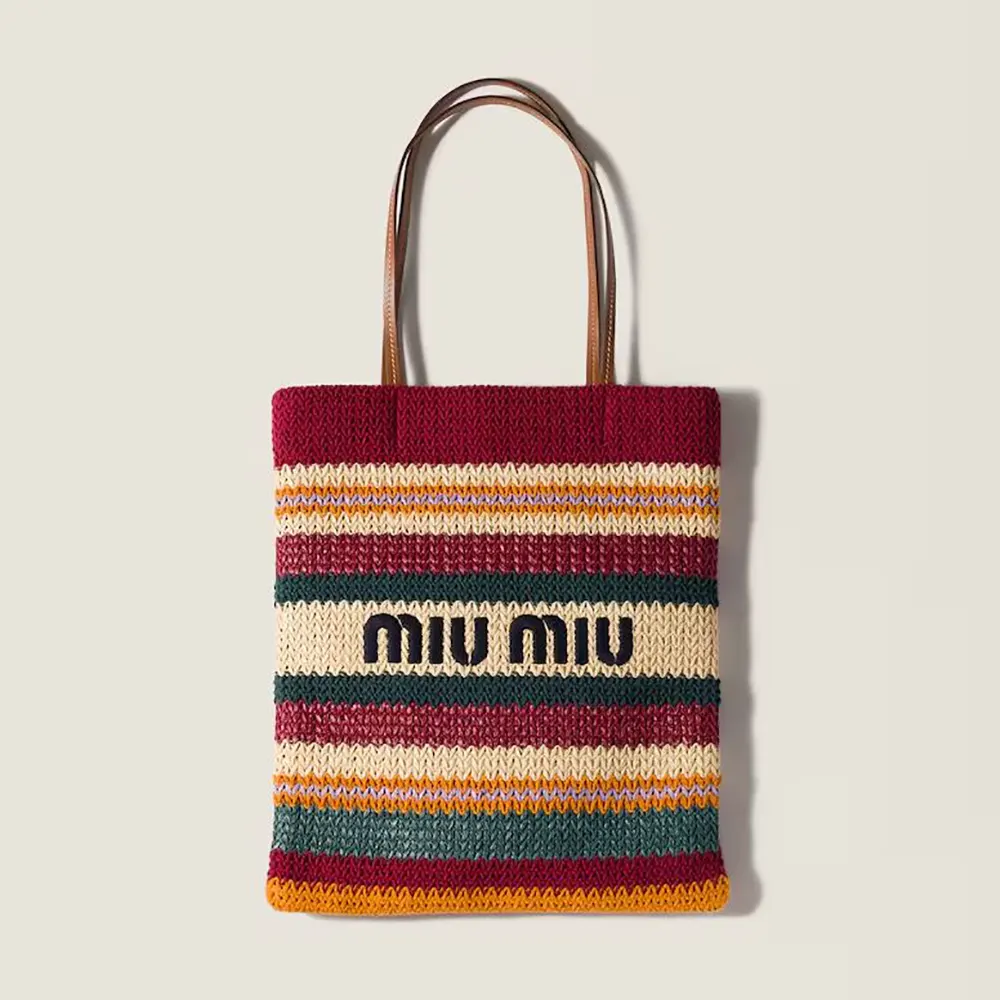 Front angle of Miu Miu Women Raffia-Effect Woven Tote Bag in red