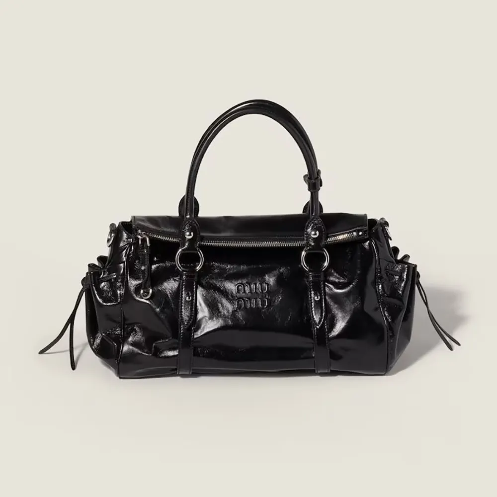 Front view of Miu Miu Women Shiny Leather Handbag-Black with flap closed