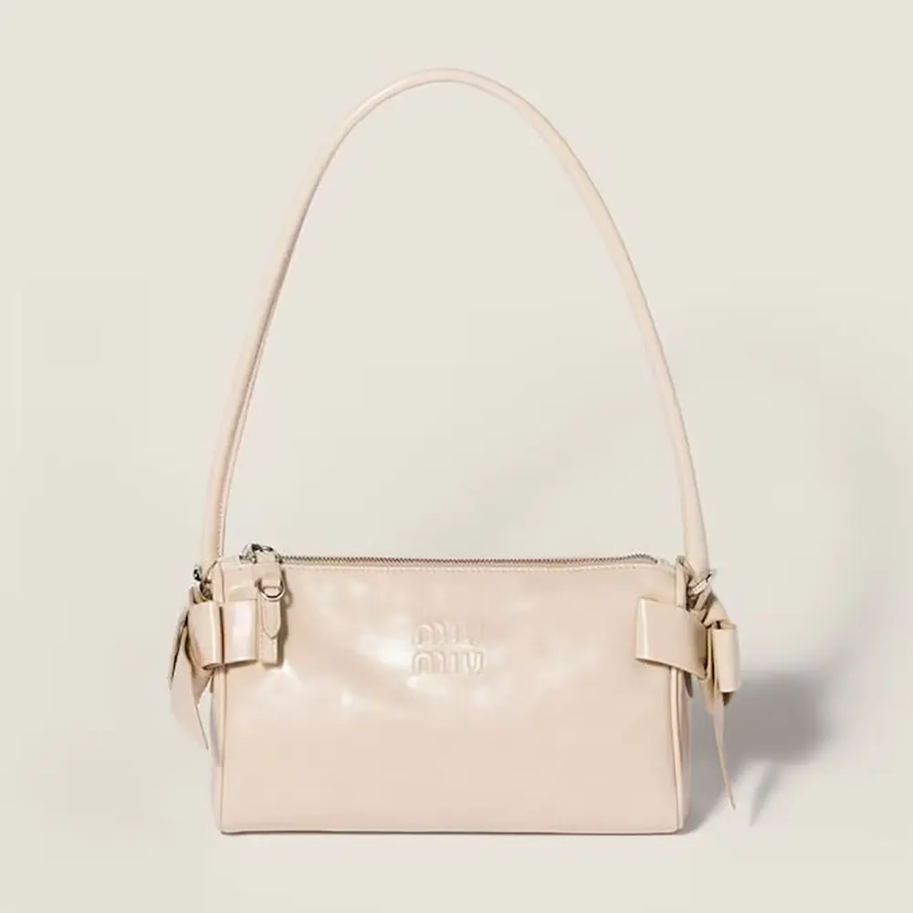 Front view of Miu Miu Women Shiny Leather Pouch-Pink with zip closure
