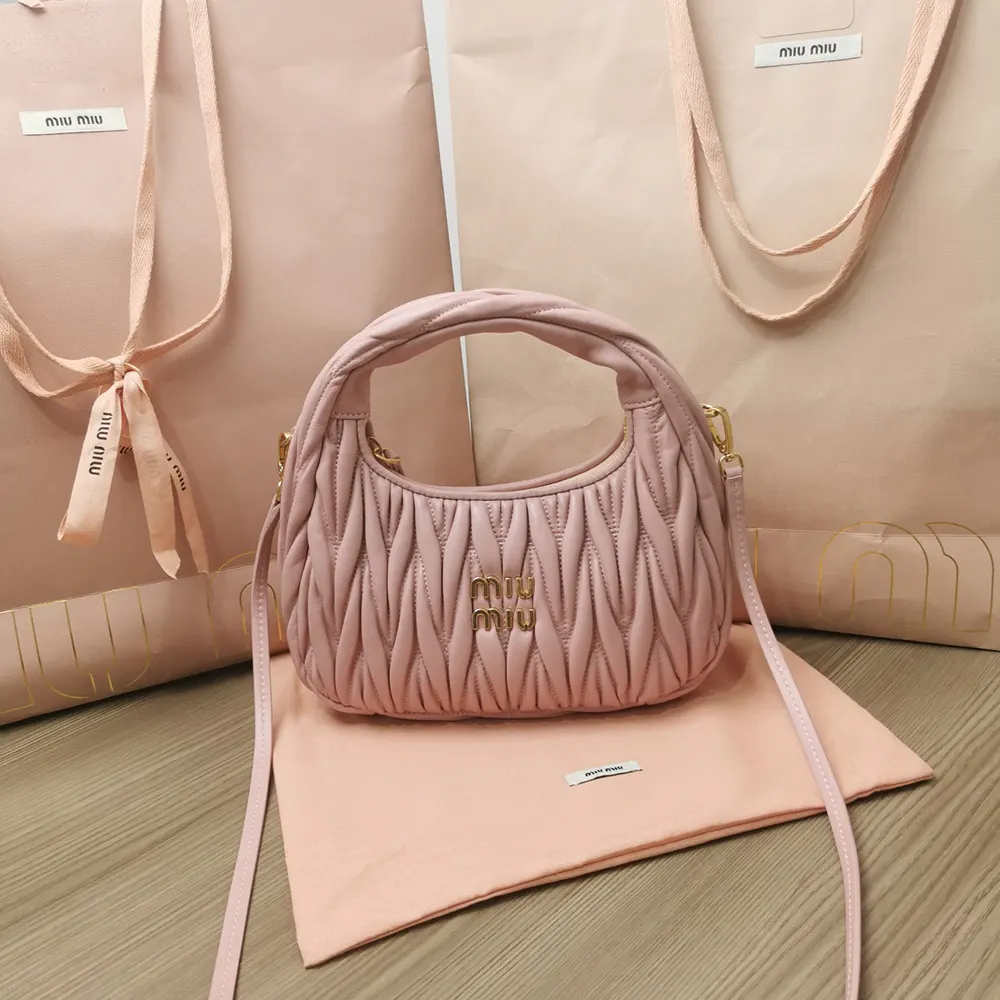 Close-up of gold-tone hardware on Miu Miu Women Wander Matelassé Hobo Bag