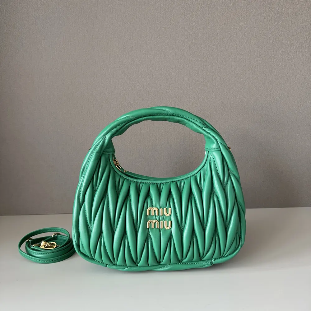 Side profile showing soft hobo shape of Miu Miu Women Wander Nappa Leather Bag