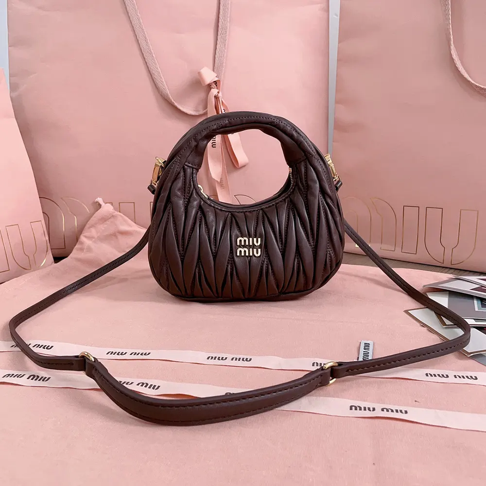 Close-up detail of matelassé quilting on Miu Miu Women Wander Hobo Mini-Bag-Burgundy