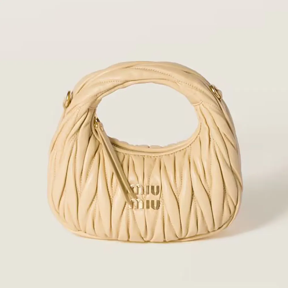 Front view of Miu Miu Women Wander Matelassé Hobo Mini-Bag Light Yellow