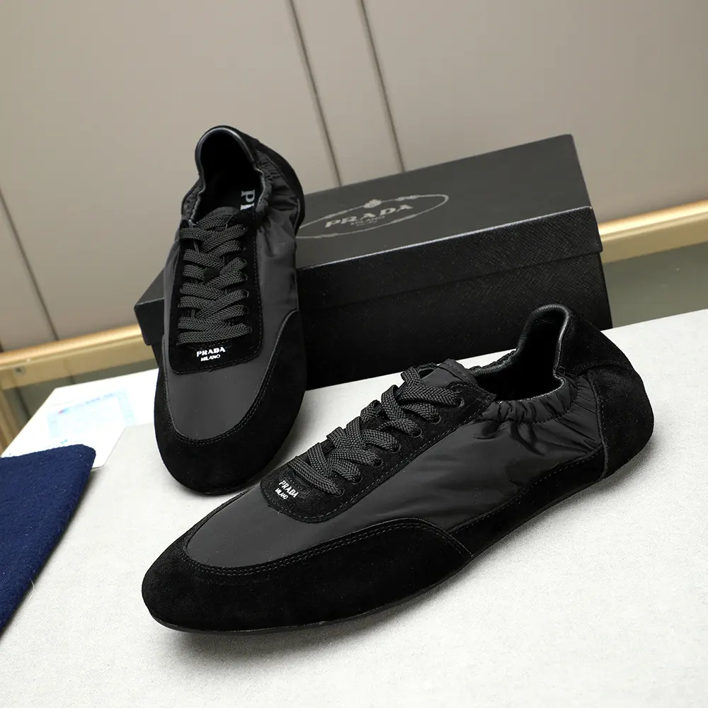Overhead shot showing the sole and silhouette of Prada Unisex Collapse sneakers