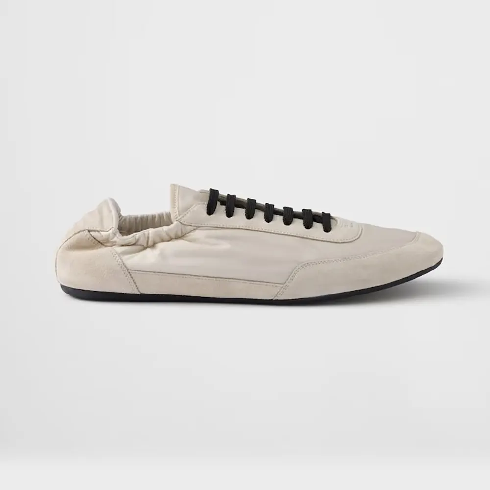 Side view of Prada Unisex Collapse Re-Nylon and Suede Elasticized Sneakers-Ivory