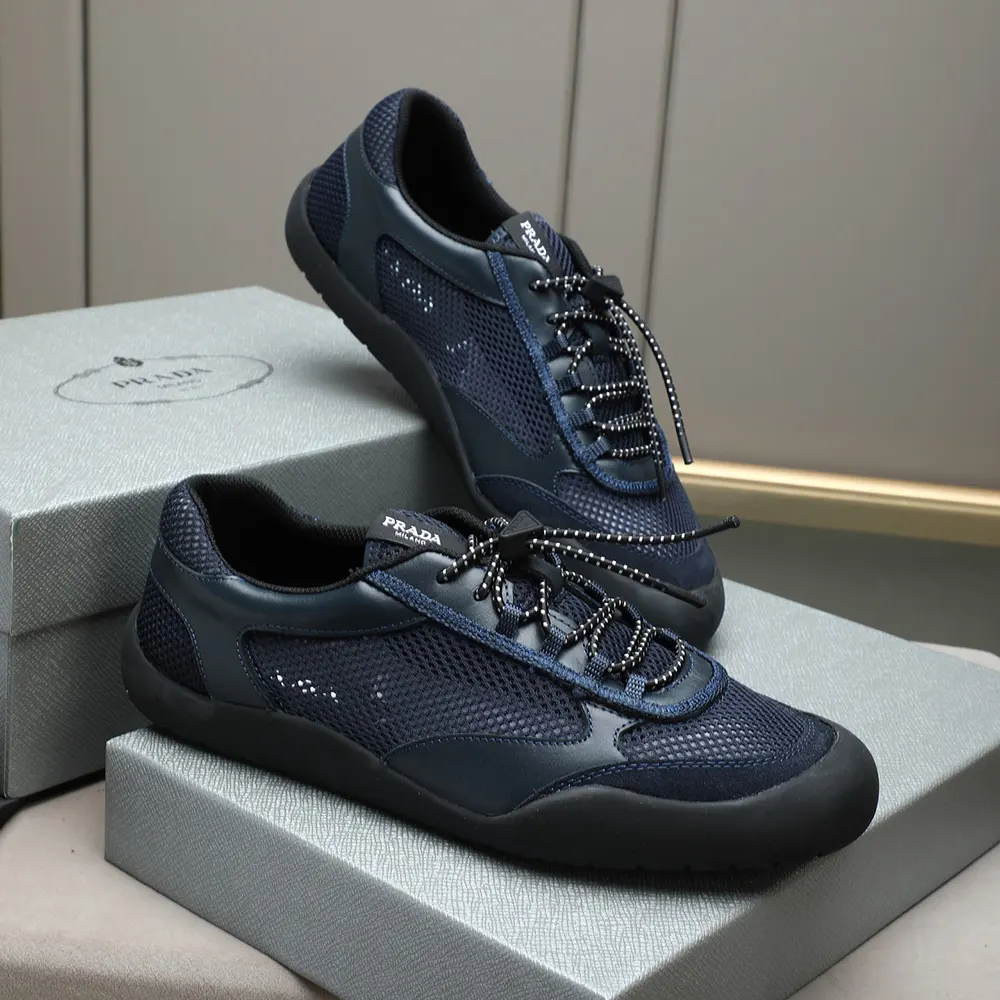 Top view highlighting lace-up closure on Prada Unisex Speedrock Sneakers in navy