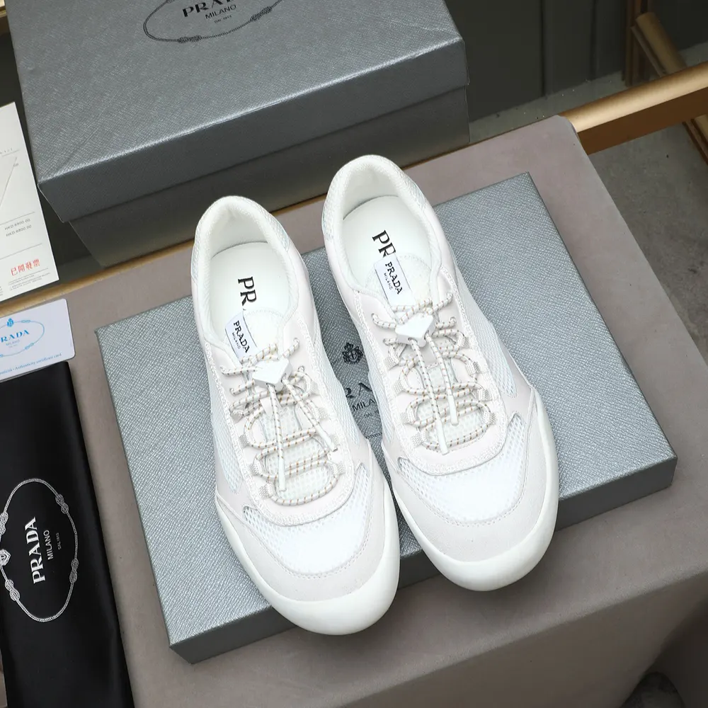 Close-up of white patent leather and mesh detail on Prada Speedrock sneakers