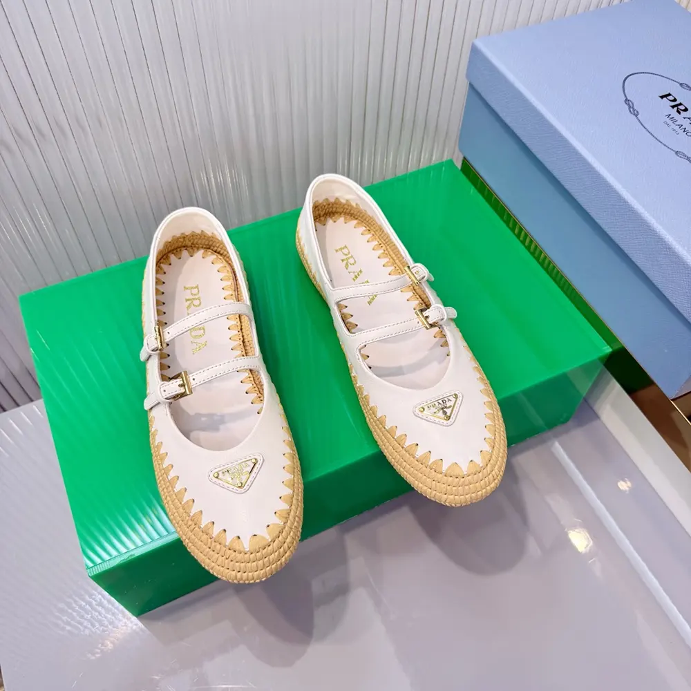 Close-up on raffia texture and white nappa leather of Prada ballerinas