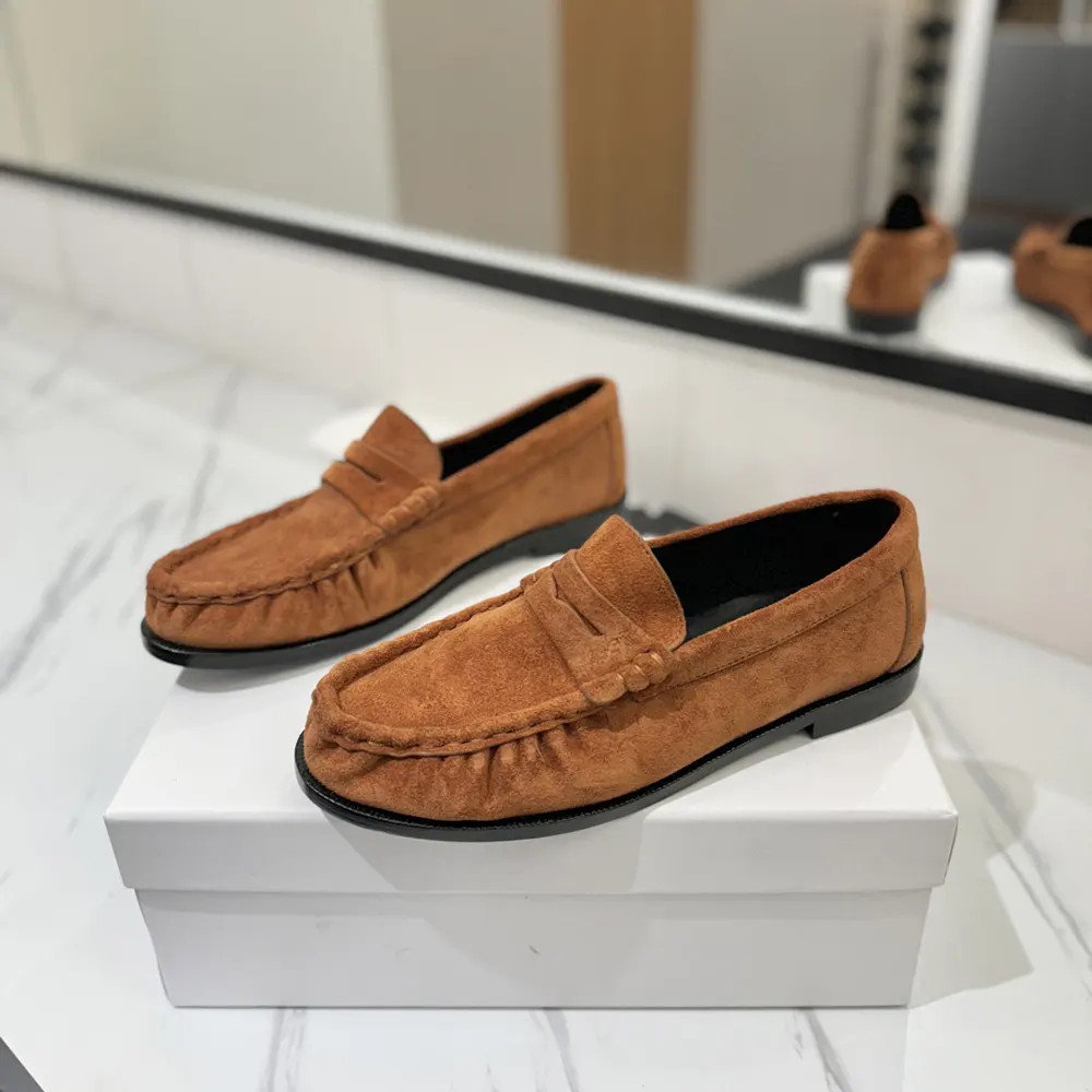 Overhead view showing classic silhouette of Saint Laurent YSL Unisex Laurent Loafers