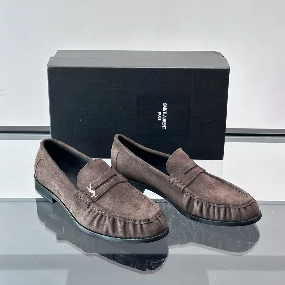 Close-up of YSL hardware detail on Saint Laurent Le Loafer Supple