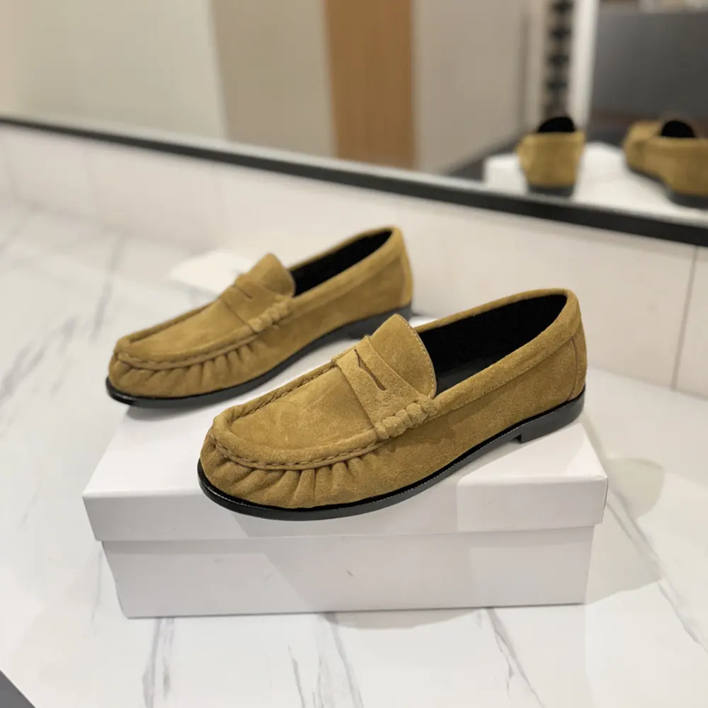 Top view showing supple brown suede and classic loafer silhouette