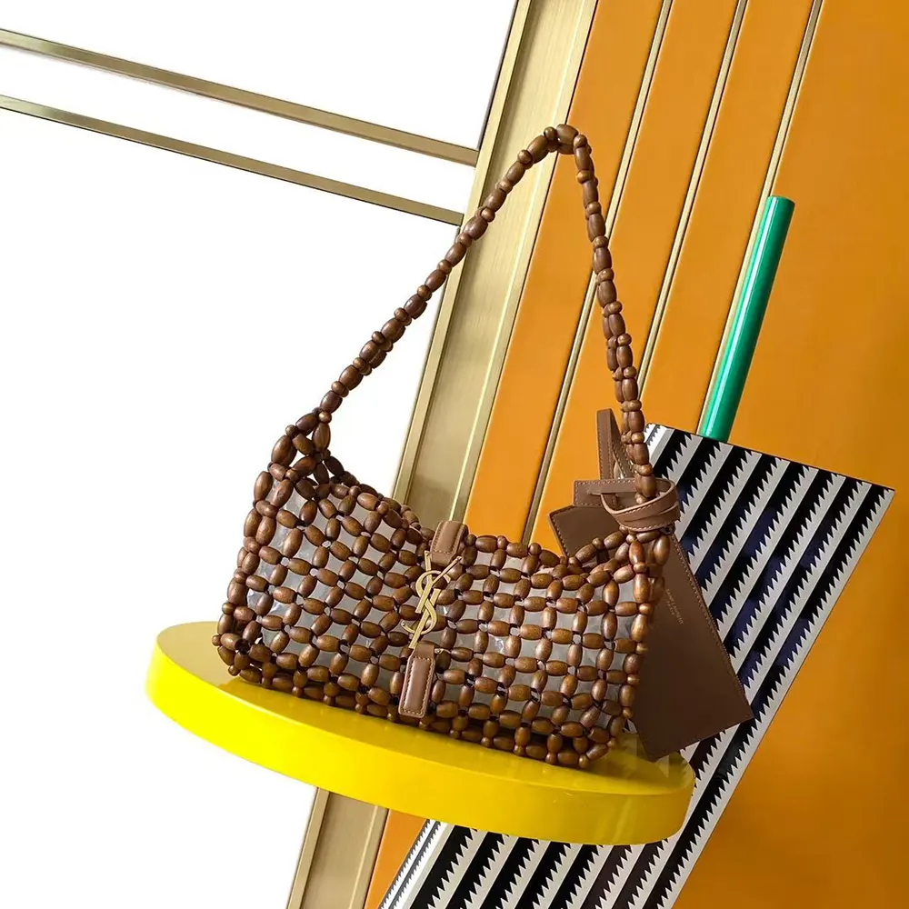 Side angle showing silhouette of Saint Laurent YSL Women Le 5 À 7 In Wood Beads-Brown