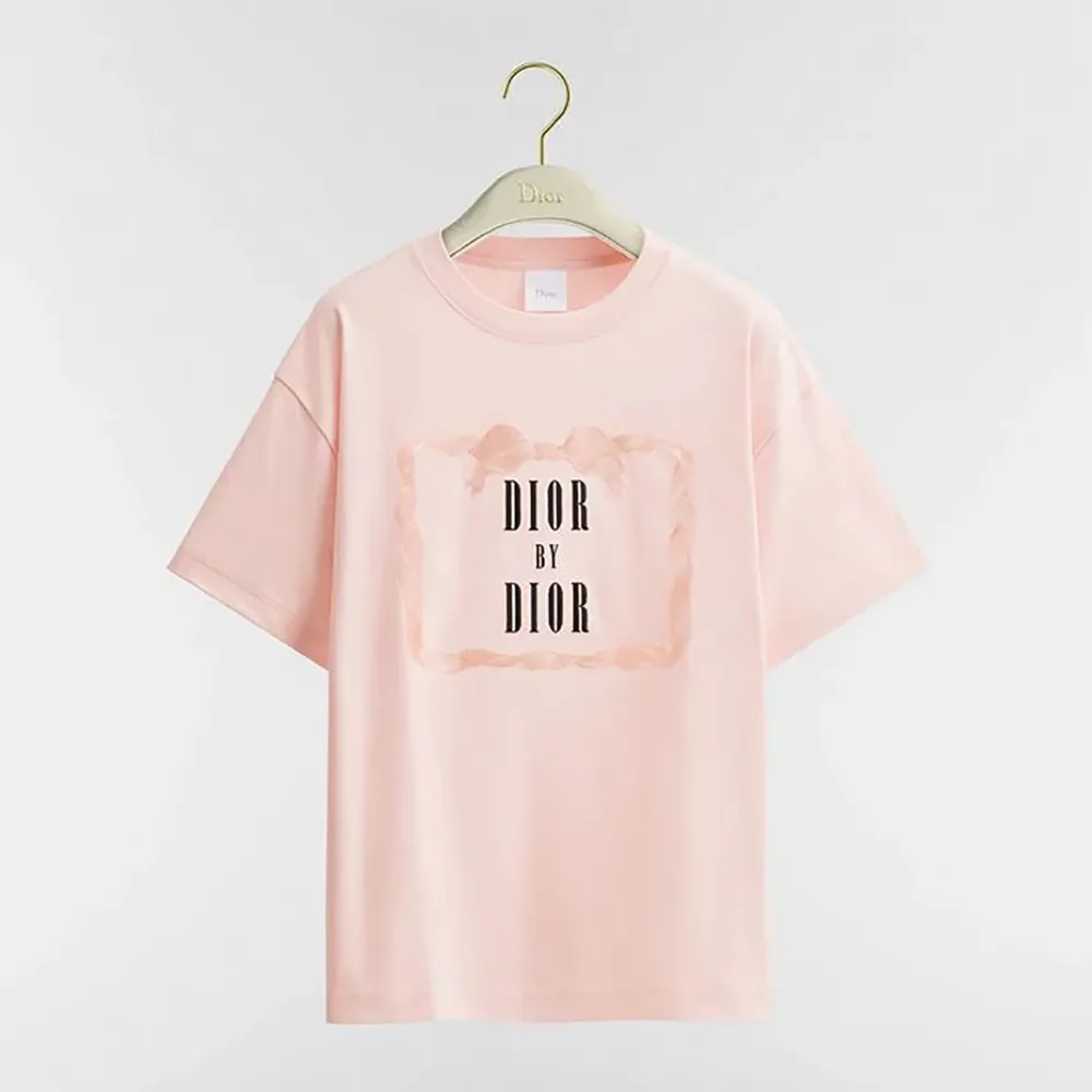 Front view of Dior Women Oversized Embroidered Book Cover T-Shirt in pink cotton jersey