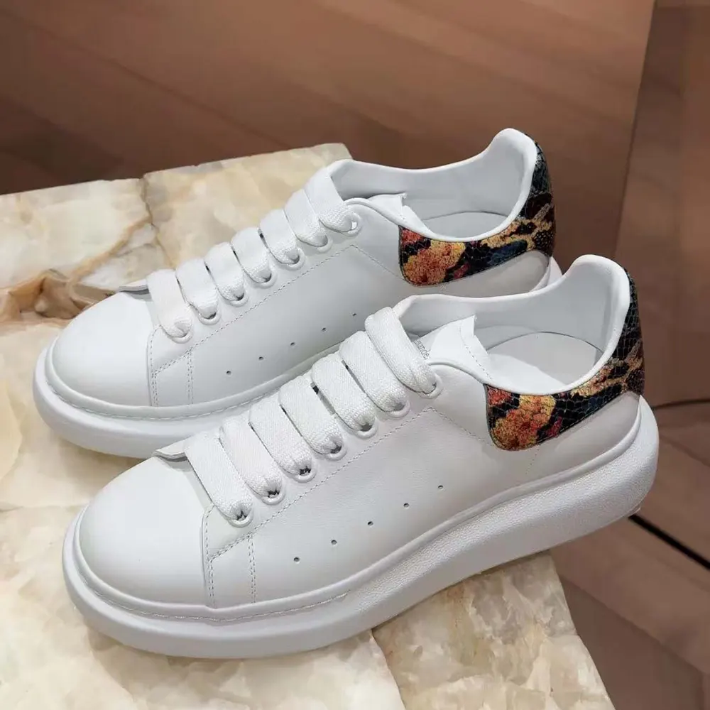 Close-up of multicolour heel tab on Alexander Mcqueen Unisex Oversized Sneaker