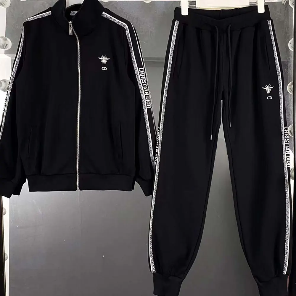 Close-up on embroidered bee detail of Dior Men Black & White Tracksuit