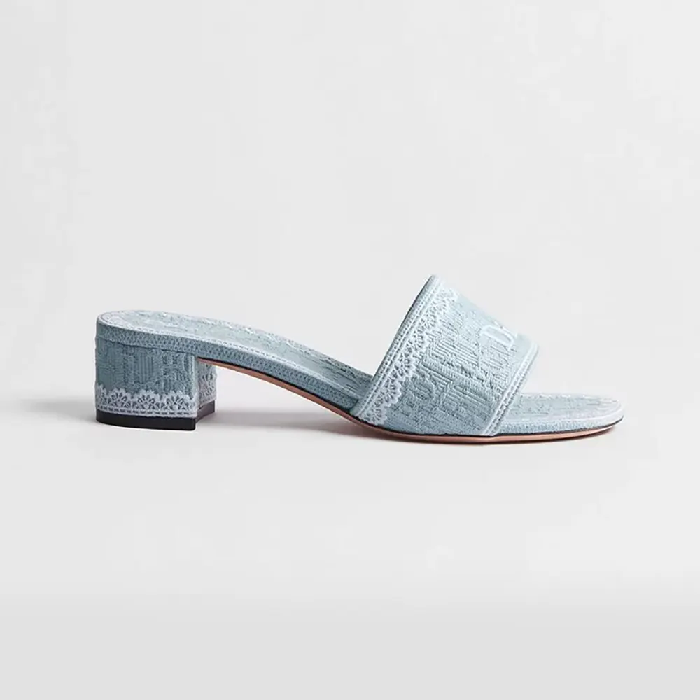 Side view of Dior Women Dentelle Heeled Slide Sky Blue with lace detail