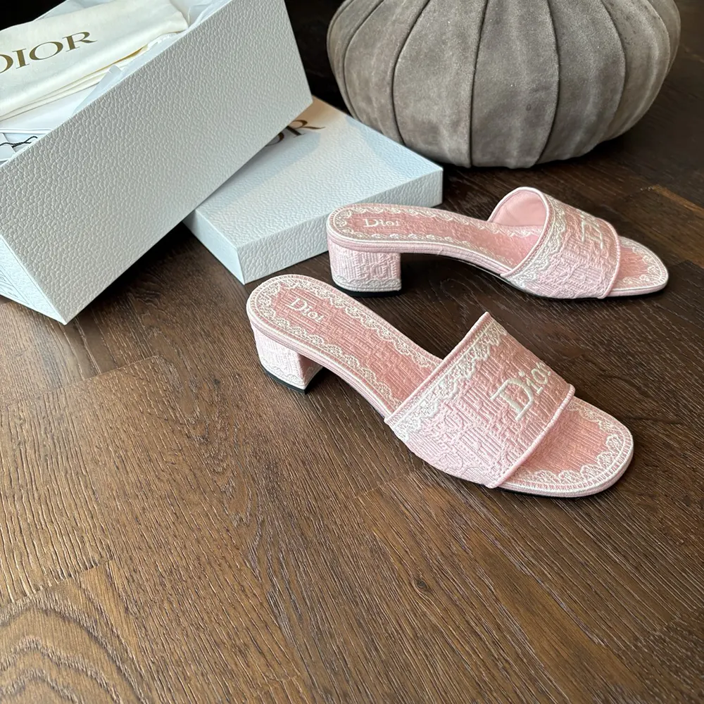 Close-up of Dior Oblique embroidery on Dior Dentelle Heeled Slide