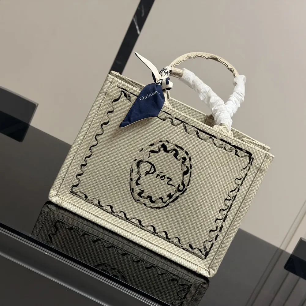 Close-up of painted ribbon embroidery on Dior Women Dioriviera tote