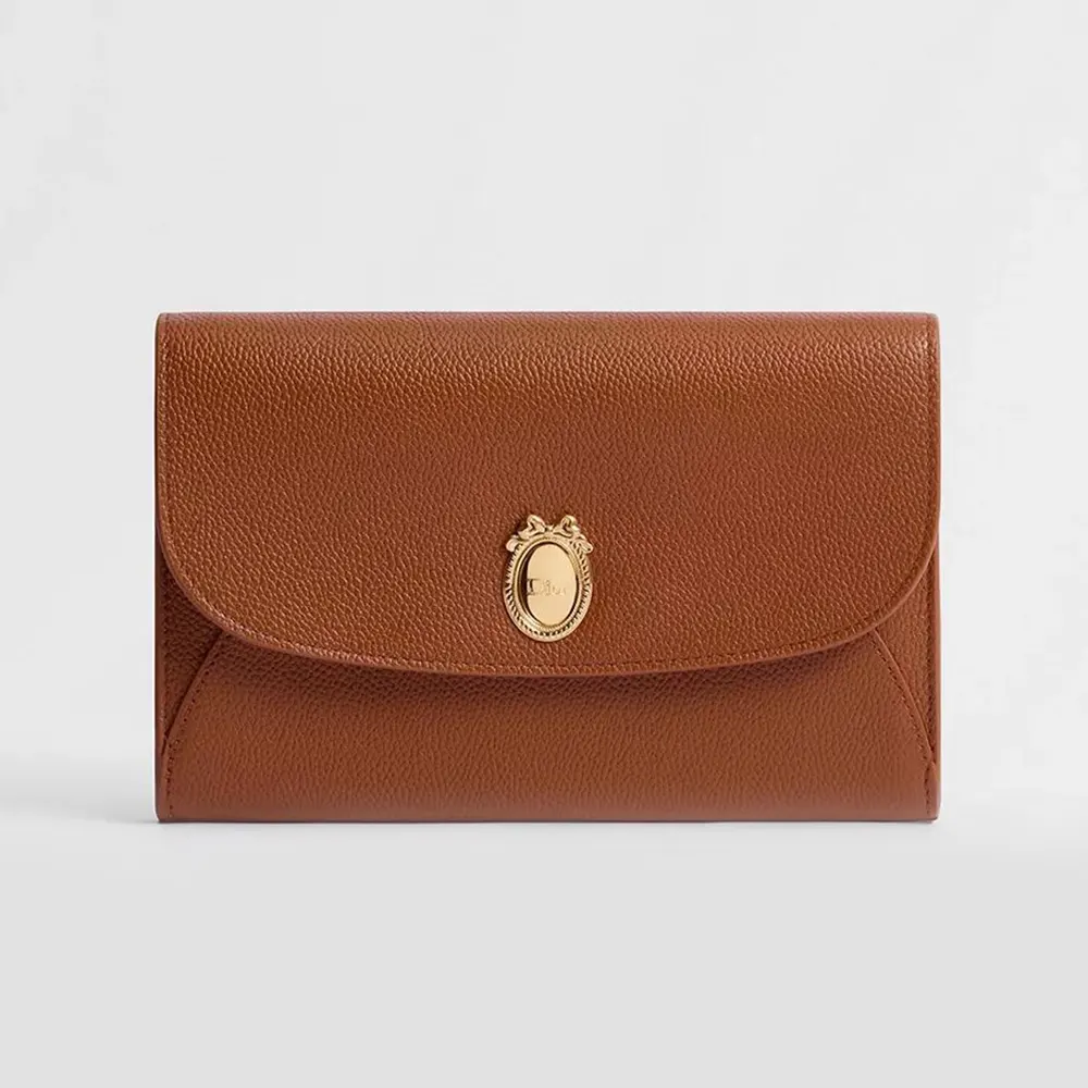 Front view of Dior Women Médaillon Envelope Pouch with flap closed