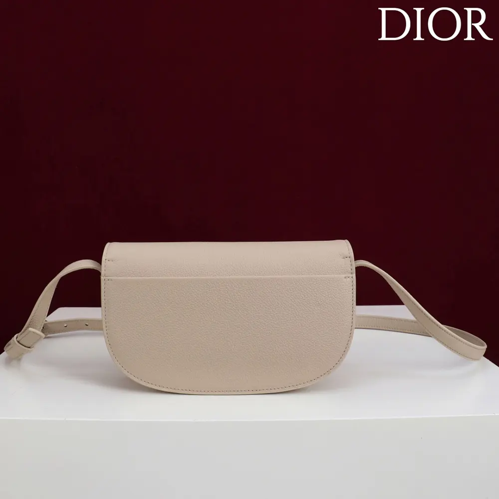 Side angle showing grained calfskin texture on Dior Women Small Dior Médaillon Flap Bag