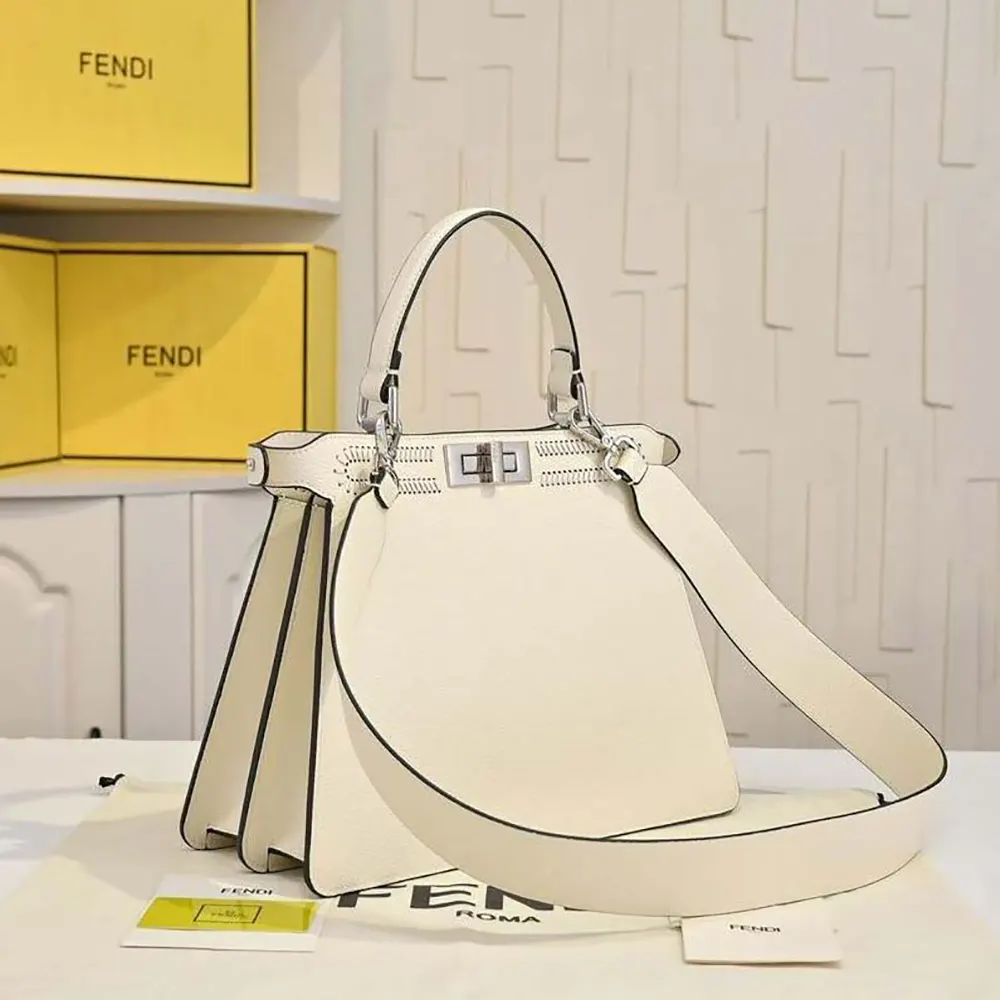 Side profile showing gold hardware on Fendi Women Peekaboo ISeeU Bag