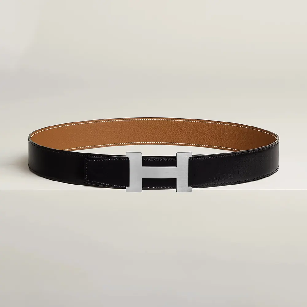 Front close-up of Hermes Unisex Constance Belt Buckle in polished metal