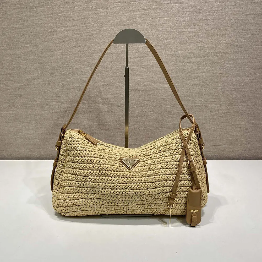 Close-up of silver hardware and crochet detail on Prada Women Aimée bag
