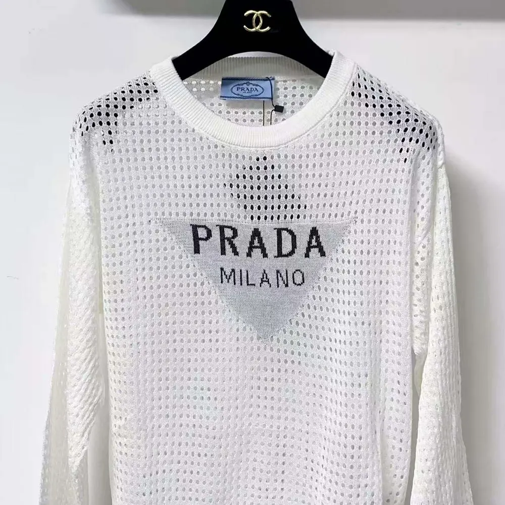 Side angle showing relaxed silhouette of Prada Women Milano Open-knit Top-White