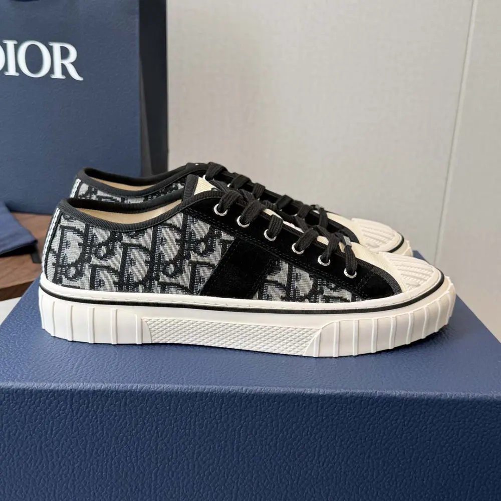 Top-down angle showing laces and silver Dior hardware on the Hooper sneaker