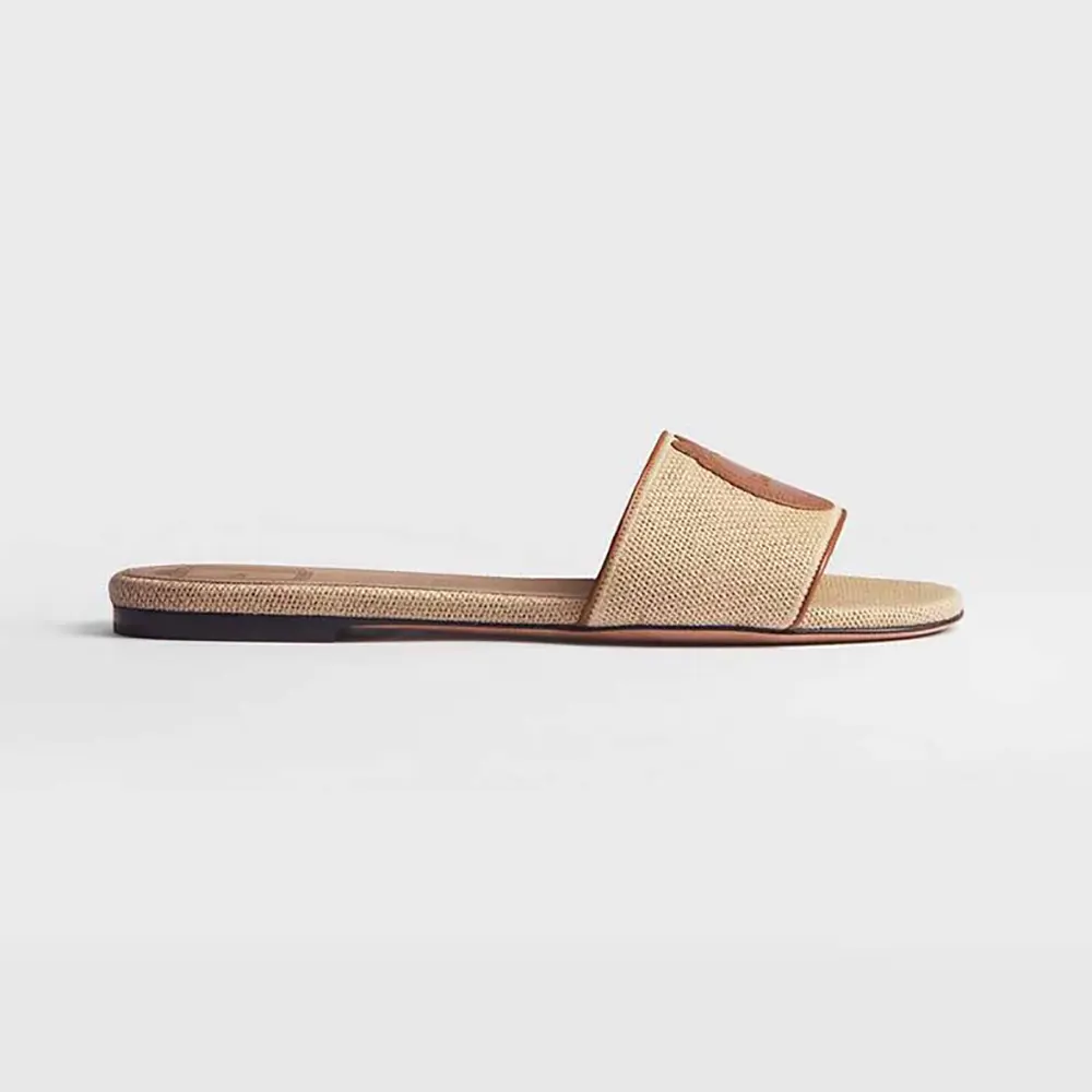 Side angle of Dior Women Dioriviera Dior Médaillon Slide natural embroidered cotton