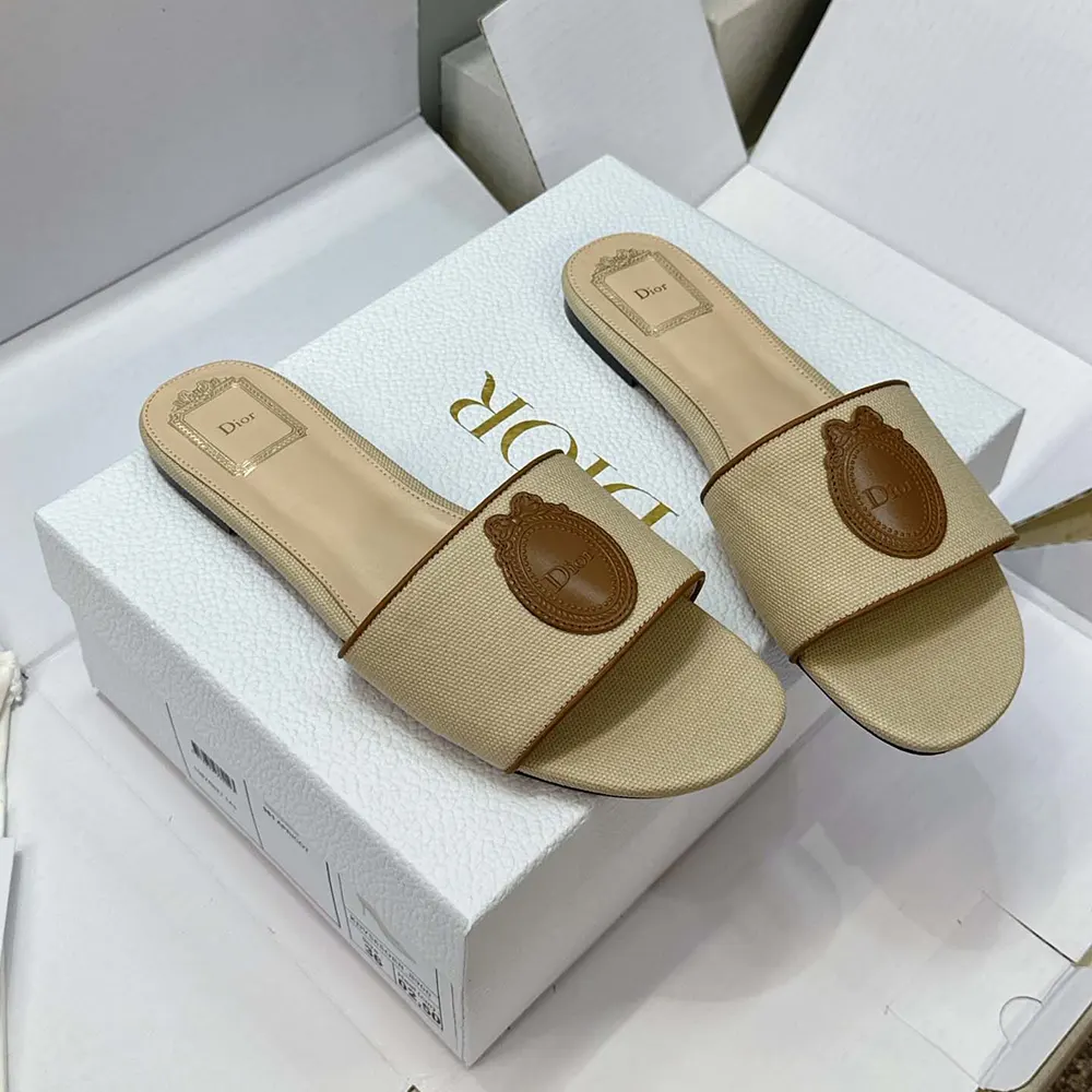 Top view showing embroidered cotton upper and slip-on design of Dior Médaillon Slide