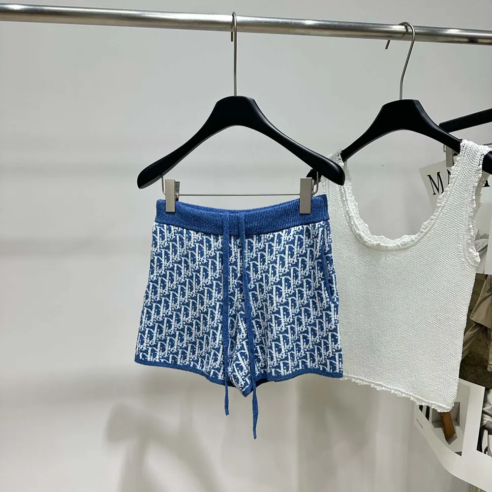 Close-up detail of Dior Oblique jacquard pattern on Dioriviera shorts