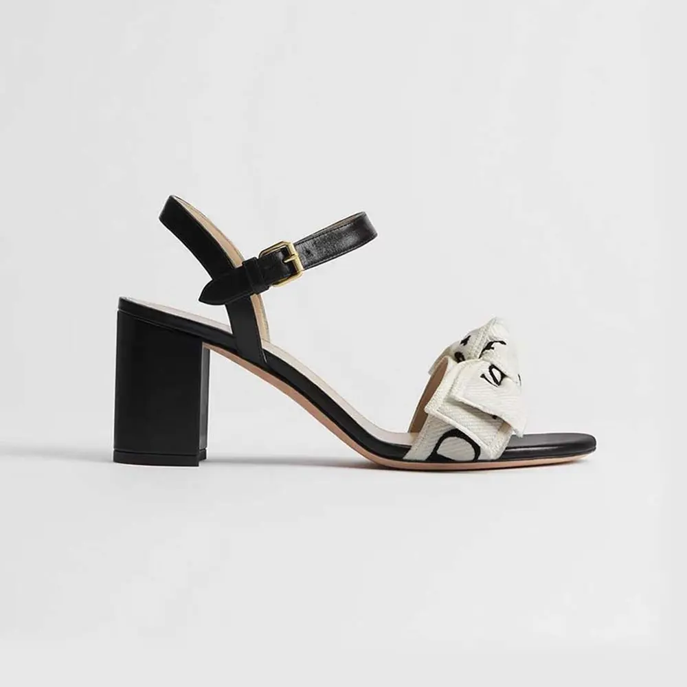 Side profile of Dior Women J’Adior Heeled Sandal embroidered cotton black lambskin