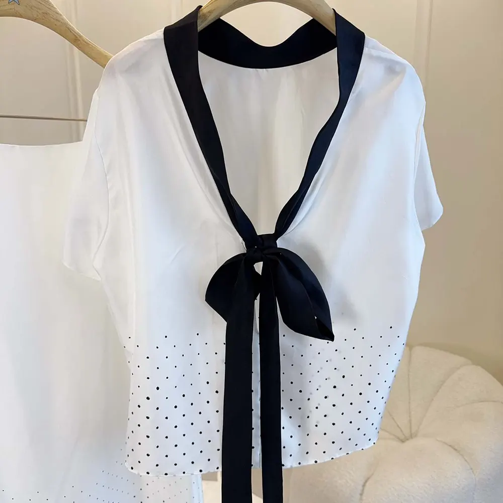 Close-up detail of rear tie on Dior Women Short-Sleeved Blouse with Rear Tie White Silk Twill