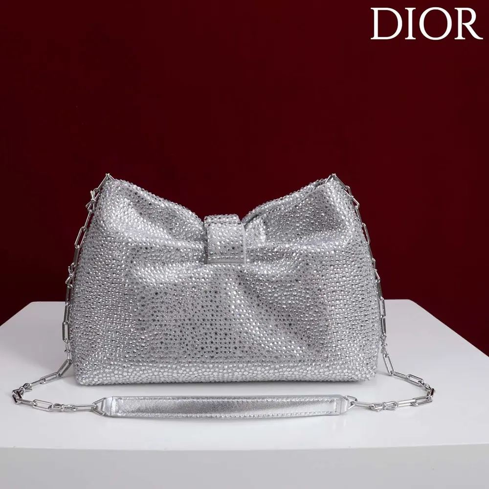 Close-up of silver-tone hardware and strass on Dior Women Small Dior Bow Bag