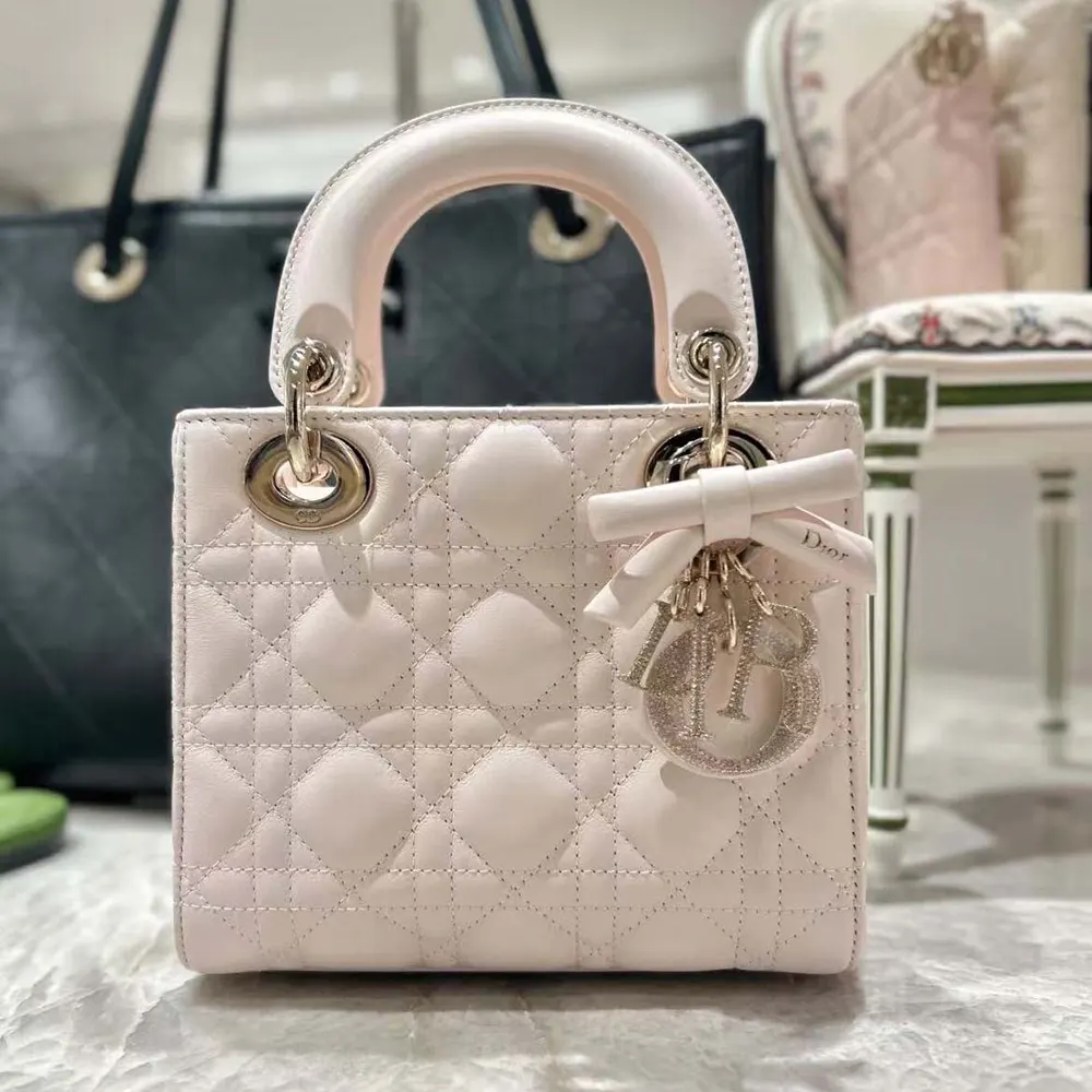 Side angle showing chain strap and signature Cannage quilting on Lady Dior bag