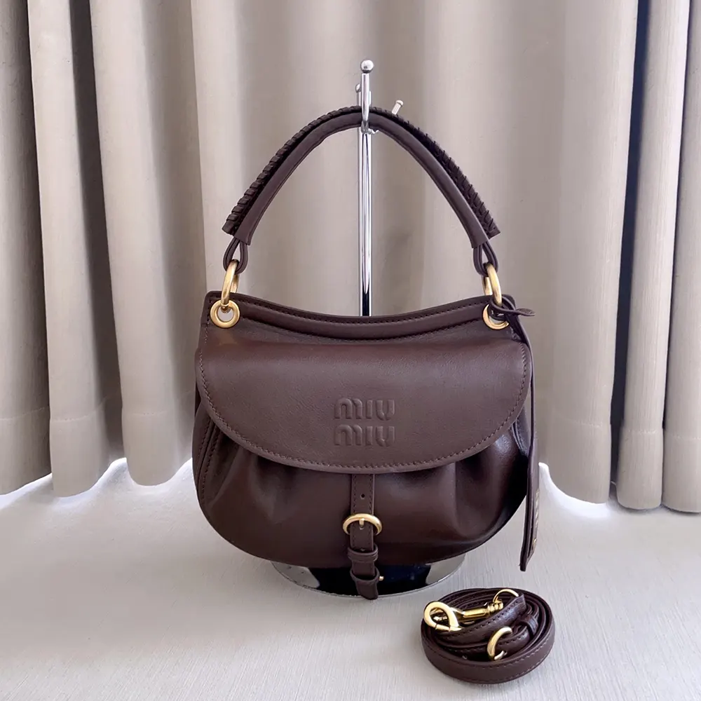 Side profile showing silhouette of Miu Miu Women Rendez-Vous Nappa Leather Bag Briarwood