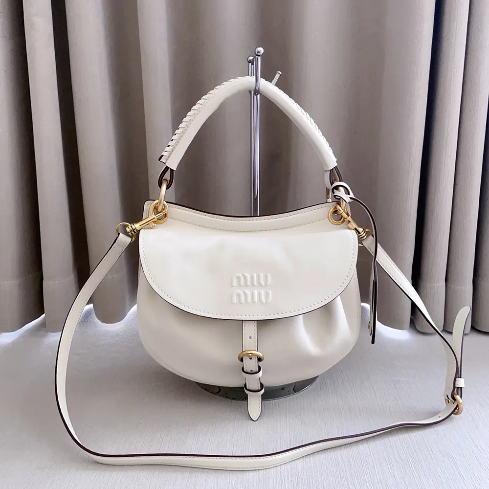 Side angle showing silhouette of Miu Miu Women Rendez-Vous Nappa Leather Bag