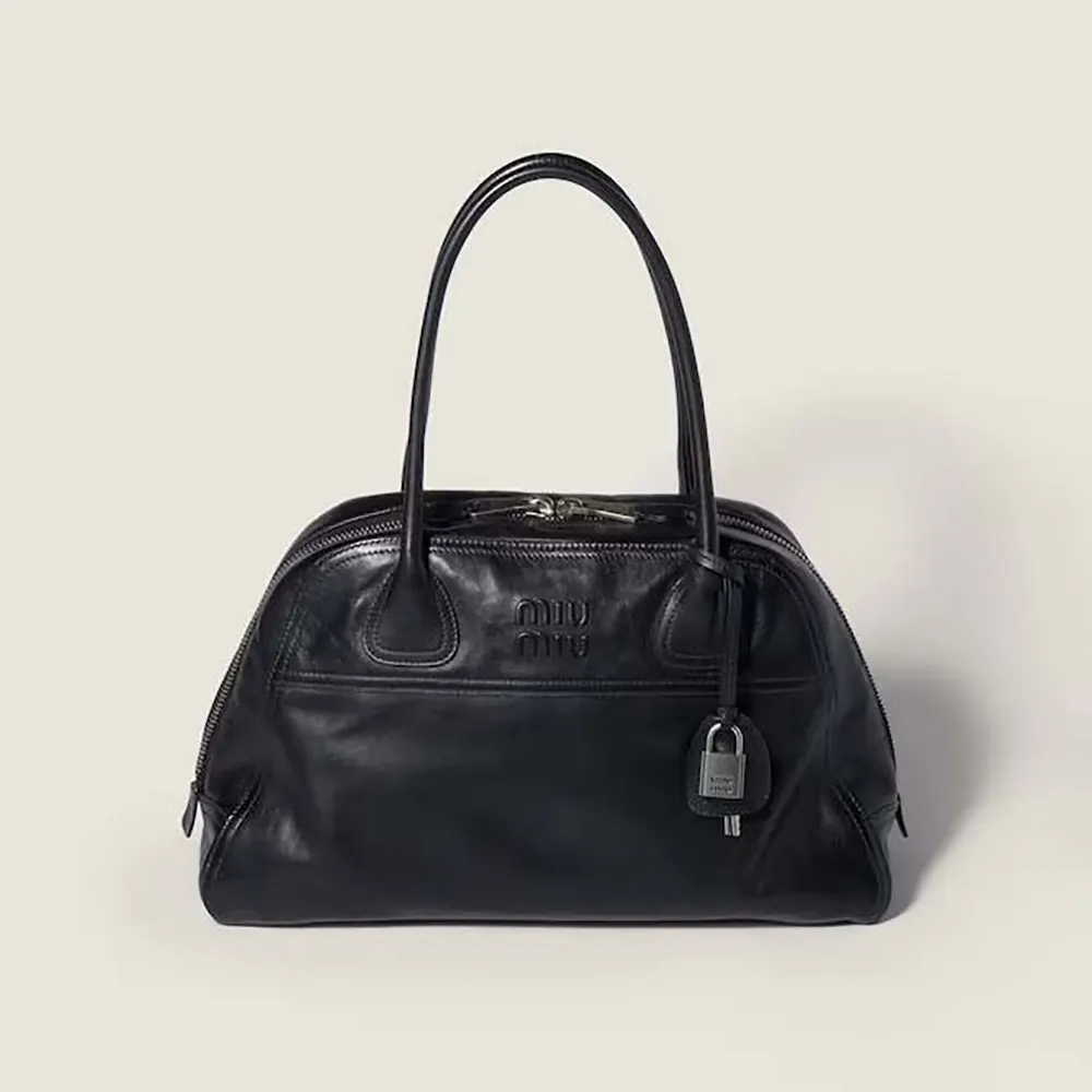 Front view of Miu Miu Women Vivant Leather Bag Black showing flap closure