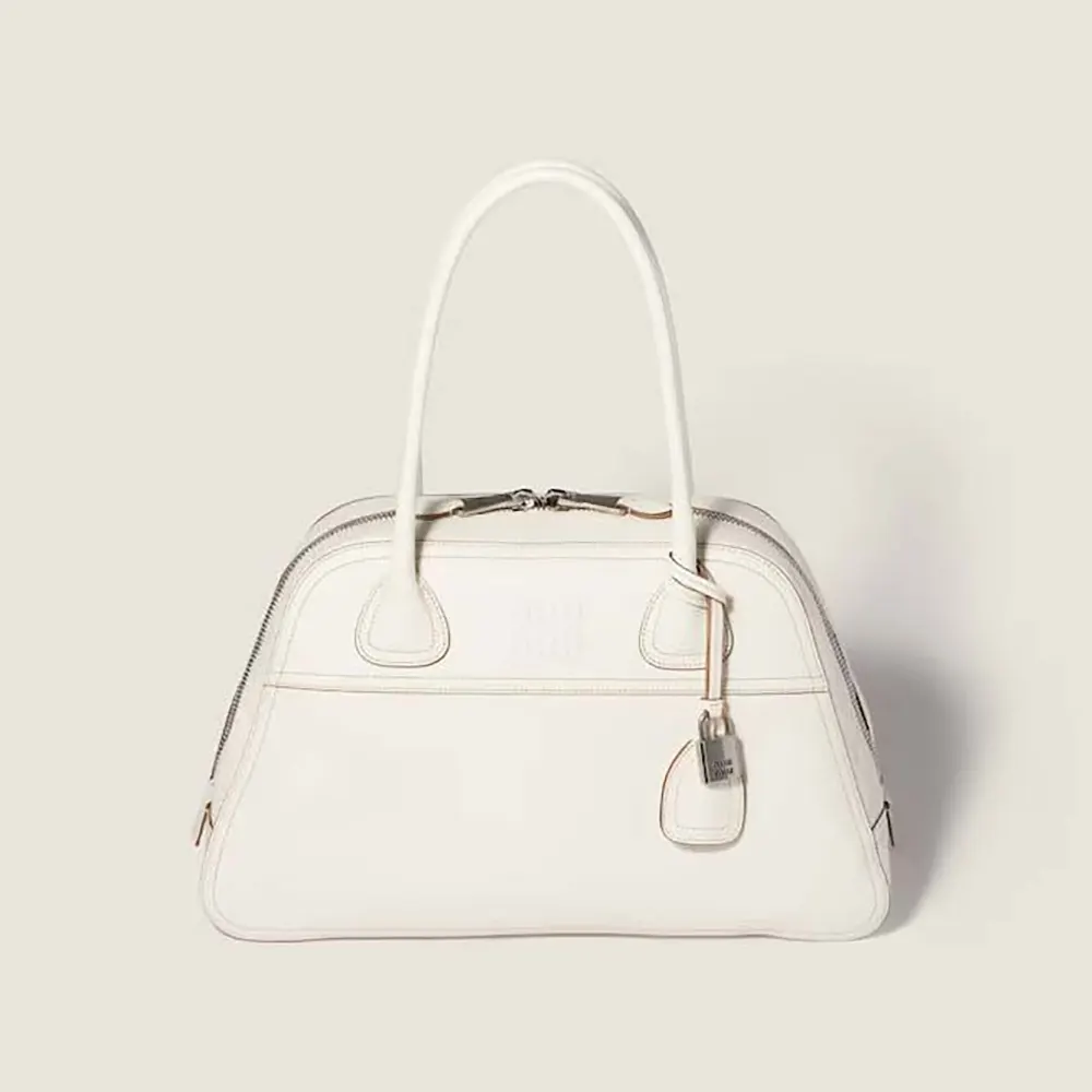 Front angle of Miu Miu Women Vivant Leather Bag Chalk White showing clasp