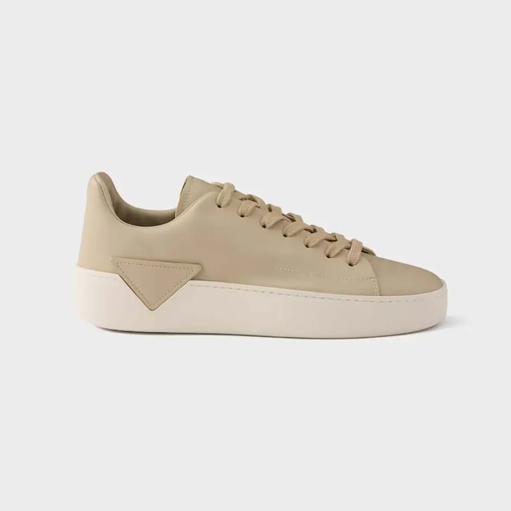 Side profile of Prada Unisex Court Leather Sneakers-Desert Beige