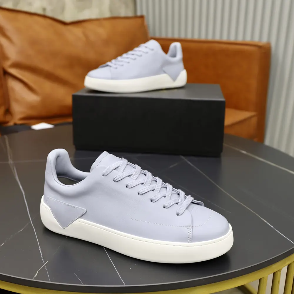 Top-down shot showing lace-up detail on Prada Unisex Court Leather Sneakers